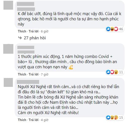 Khoảnh khắc xúc động người đàn ông che mũ cho tượng Bác trong mưa lũ 0