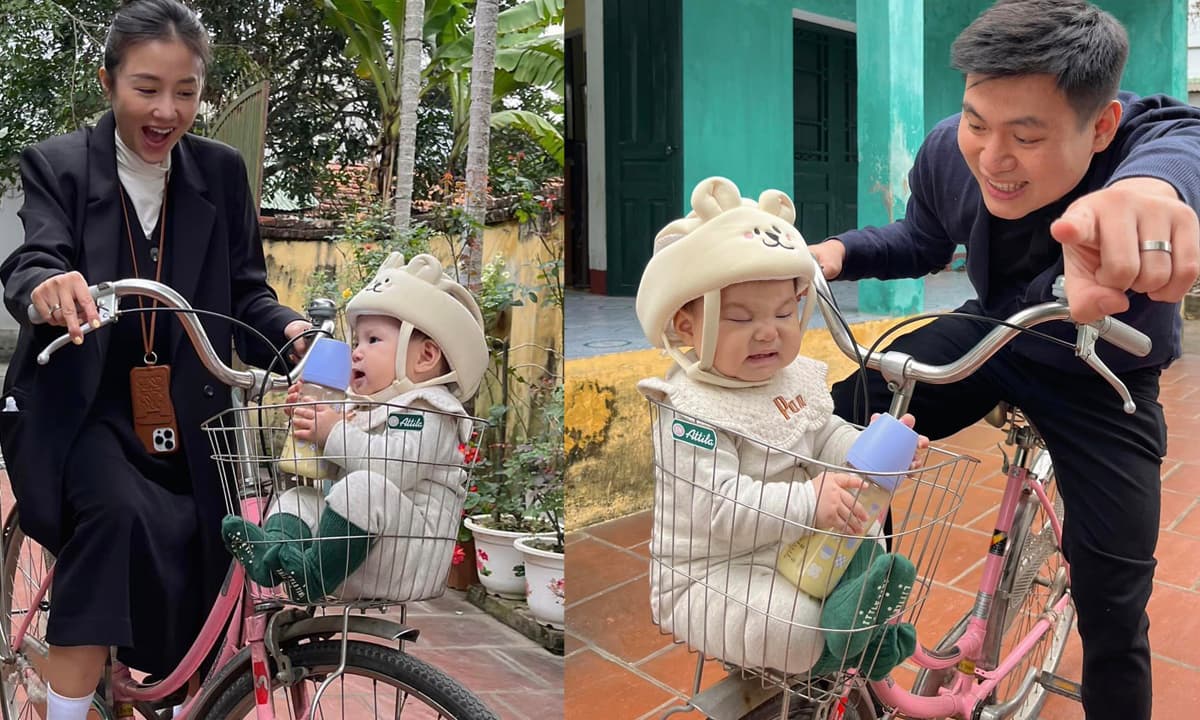 Con gái Salim được bố mẹ cho ngồi giỏ xe đạp khi về quê, biểu cảm 'tấu hài' cực yêu 