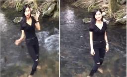 Mặc kệ biển báo cấm, gái xinh lội xuống suối cá thần ở Thanh Hóa gây tranh cãi