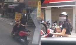 Vừa lái xe vừa cho con trai bú, mẹ bỉm sữa khiến dân mạng xôn xao bàn tán