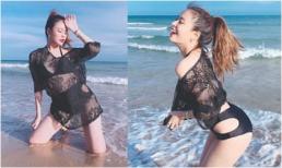 Hình ảnh Hoàng Thùy Linh hiếm hoi mặc bikini trước biển được chia sẻ rộng rãi
