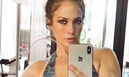 Jennifer Lopez khoe ảnh body, nhưng điều khiến fan hoảng sợ là người đàn ông bí ẩn sau lưng