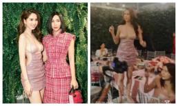 Ngọc Trinh phô ngực đầy gợi cảm, lột giày leo lên ghế 'quẩy' hết mình mừng Instagram cán mốc 5 triệu follow