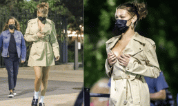 Chỉ mặc áo khoác ngắn, Bella Hadid kéo áo che vòng một hững hờ nhưng cũng đủ hút mọi ánh nhìn