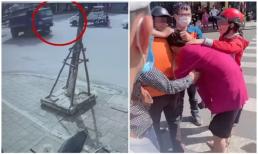 Khoảnh khắc cô gái bị xe tải cán qua người khi dừng đèn đỏ, người thân khóc ngất tại hiện trường