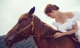 Ngọc Trinh cưỡi ngựa, diện váy dạ hội như công chúa lạc trong rừng