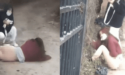 Gái xinh trèo tường để trốn học, không may chiếc váy mắc vào hàng rào khiến ai cũng 'ngượng chín mặt'