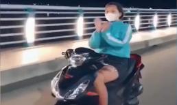 Nữ 'quái xế' đầu trần, thả 2 tay múa quạt còn tạo dáng trái tim gây bức xúc