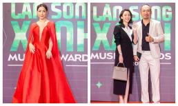 Hoà Minzy diện tông đỏ rực với phần ngực khoét sâu, vợ chồng Thu Trang - Tiến Luật tình tứ trên thảm đỏ