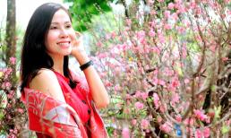 Hoa hậu doanh nhân Mai Thanh diện áo dài đỏ rực, khoe vẻ đẹp ngọt ngào xuống phố đón Xuân