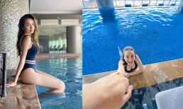 Diễm Hương đăng ảnh bikini nóng bỏng nhưng dân tình chỉ chú ý đến bàn tay người đàn ông nắm tay nàng Hậu