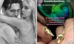 Cậu cả nhà Becks và vị hôn thê chơi trội khi khoe dây chuyền hình răng khôn bằng vàng 