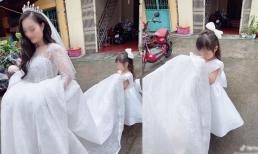 Loạt ảnh con gái nhỏ buồn thiu, nâng váy tiễn mẹ đi lấy chồng khiến dân mạng 'nhói lòng' 