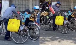 Xúc động khoảnh khắc chị gái đi xe lăn chia lại thùng mì tôm cho người đàn ông khó khăn hơn