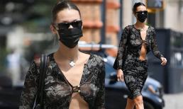 Siêu mẫu Bella Hadid phanh gần hết vạt áo lấp ló vòng một không nội y