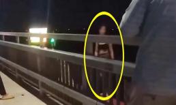 Cô gái trẻ nhảy cầu Nhật Tân, tạo dáng chụp ảnh trước khi gieo mình tự tử và sau đó tự bơi được vào bờ