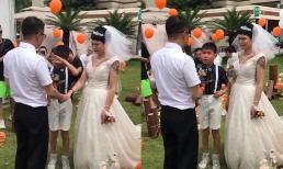 Bé trai lau nước mắt làm chủ hôn trong ngày vui của mẹ với cha dượng khiến ai cũng xúc động