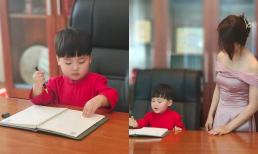 'Chủ tịch' Bo nhà Hòa Minzy đáng yêu hết nấc khi 'xông đất' bàn làm việc phụ bố mẹ đầu năm mới, nhóc tỳ diện áo dài xinh xắn