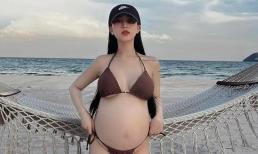 Bụng bầu 'vượt mặt', ái nữ nhà Minh Nhựa vẫn tự tin diện bikini nhỏ xíu