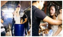 Nhật Kim Anh lần đầu đăng ảnh bị tra tấn vì nghệ thuật: Sặc nước, bị dốc ngược đầu vào thùng, nín thở gần một phút