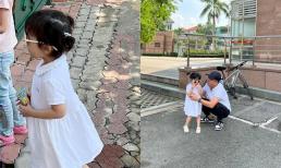 Con gái Trường Giang diện váy bồng bềnh và đeo kính râm, liên tục đùa giỡn cùng ba trong ngày bế giảng