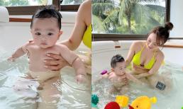 Bà xã Chi Bảo khoe loạt ảnh diện bikini cực quyến rũ tắm cùng con trai cưng, tiết lộ về thói quen mỗi sáng tốt cho nhóc tì 