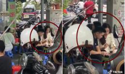 Hoa hậu Đỗ Mỹ Linh và Đỗ Vinh Quang giản dị ngồi ăn lề đường cùng nhau