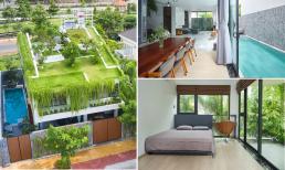 Thiết kế nhà mái dốc phủ đầy cỏ và cây xanh tươi mát