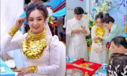 Cô dâu hot nhất hôm nay: Đeo 50 cây vàng nặng 2 kg, cười tươi rói trong ngày cưới