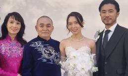 Xuân Hinh và bà xã diện áo dài đón khách trong ngày cưới con gái 