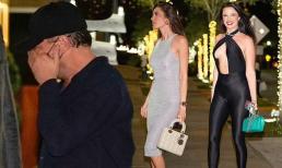 Leonardo DiCaprio che mặt tránh ống kính máy quay khi tham gia bữa tiệc với dàn người đẹp 'ngực khủng'