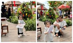 Cặp song sinh nhà Vân Trang diện áo dài đôi siêu cưng, lại còn trổ tài phụ mẹ kinh doanh