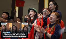 Hình ảnh Hòa Minzy đội mũ cối cổ vũ VĐV Việt Nam tại SEA Games gây sốt truyền thông quốc tế