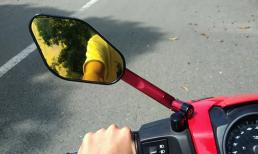 Đi xe máy thiếu một bên gương chiếu hậu có bị phạt không?