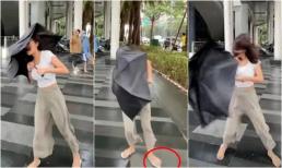 Người đẹp đưa tin về cơn bão Gaemi ngay tại chỗ nhưng cư dân mạng tỏ ra lo ngại về quần và ô của cô