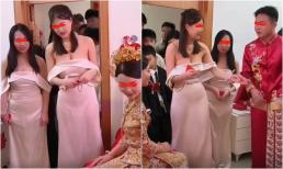 Phù dâu 'cướp sóng' cô dâu khi mặc váy ống lộ cả bầu ngực, còn thường xuyên tương tác với chủ rể 