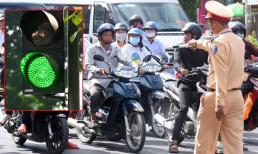 Đèn xanh còn vài giây mà đã dừng lại cũng sẽ bị CSGT xử phạt như vượt đèn đỏ, có đúng không?