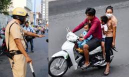 Chồng có được phép dùng xe máy chở vợ và hai con nhỏ (đều dưới 6 tuổi) hay không?