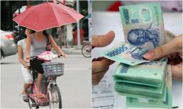 Vừa đi xe vừa cầm ô bị phạt bao nhiêu tiền?