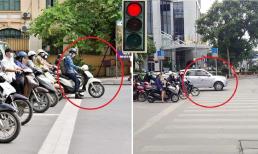  Khi dừng chờ đèn đỏ, xe dừng chờ quá vạch nhưng chưa vượt qua cột đèn tín hiệu, người tham gia giao thông có bị xử phạt?
