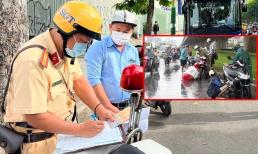 Dừng xe mặc áo mưa khi đang đi trên đường có thể bị phạt đến 5.000.000 đồng nếu rơi vào trường hợp này