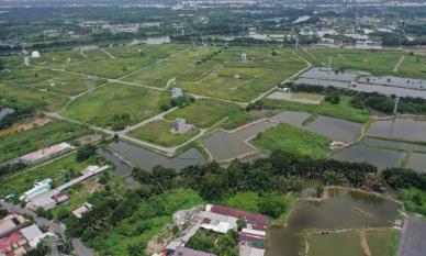 Từ bây giờ, người mua đất bỏ cọc có phải bồi thường thêm không?