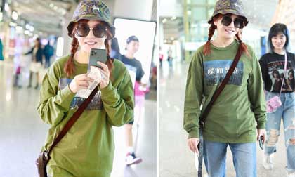 Triệu Vy tự tin để mặt mộc, 'cưa sừng làm nghé' với tóc bím và mũ tai bèo