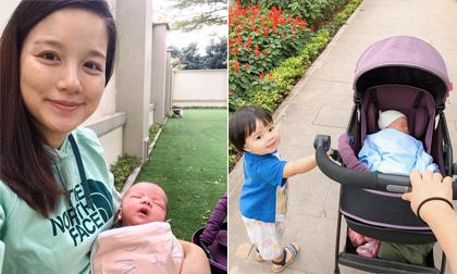 10 ngày sau khi sinh mổ, MC Minh Trang đã 'tung tăng' đưa con dạo phố