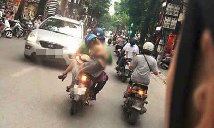 Cô gái ăn mặc hở hang trên phố khiến người đi đường 'bức bối'