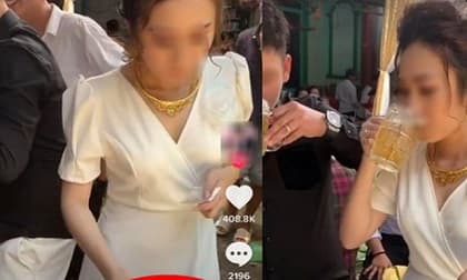 Cô dâu nhận 'bão like' khi thay chồng 'xử đẹp' đám bạn bắt uống hết bia mới được cầm phong bì