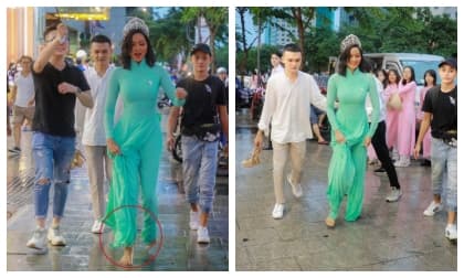 H'Hen Niê gây bão với khoảnh khắc diện áo dài đi chân trần giữa trời mưa