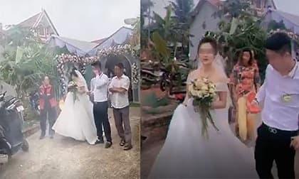 Mải nghe điện thoại, chú rể vô ý có hành động khiến cô dâu phiền lòng