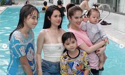 Khoe ảnh bên đại gia đình ở bể bơi, là 'Nữ hoàng nội y' nhưng Ngọc Trinh lại bị chị ruột lấn lướt