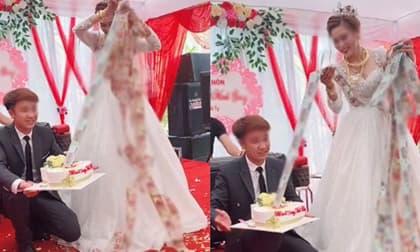 Cổ và tay đeo đầy vàng, cô dâu may mắn còn được chồng tặng chiếc bánh kem ngập tiền trong tiệc cưới